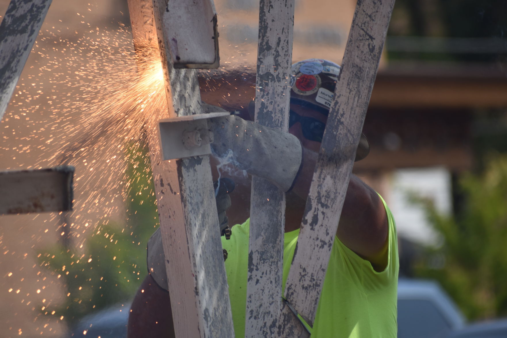 A towering job: Crews dismantle phone tower